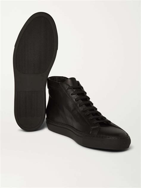 common projects high top sneakers.